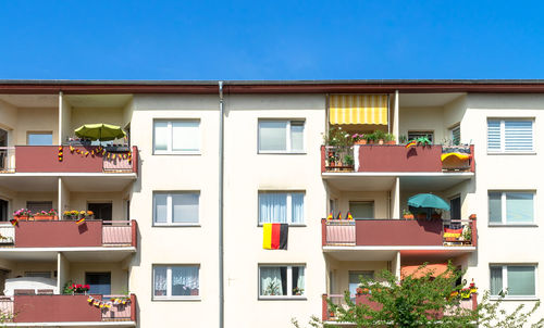 Low angle view of building against blue sky