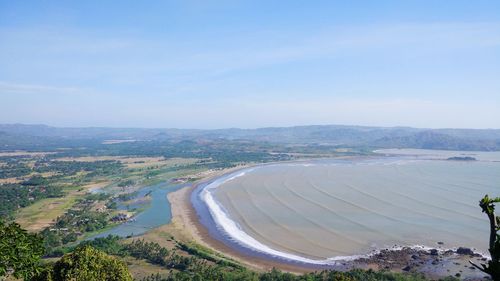 High angle view of river amidst landscape against sky