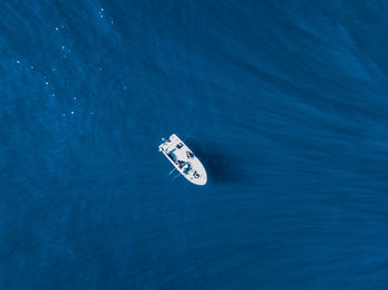 High angle view of ship sailing in sea