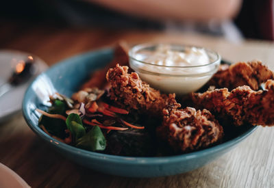 Close-up of food served on table