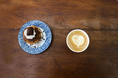 High angle view of coffee cup on table