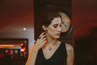 Portrait of young woman using smart phone