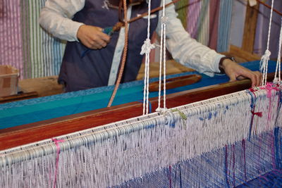 Man working at handloom factory