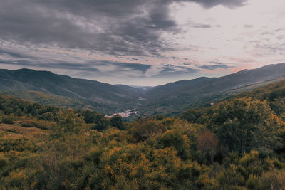 Scenic view of mountains against sky during sunset