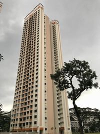 Low angle view of modern buildings against sky