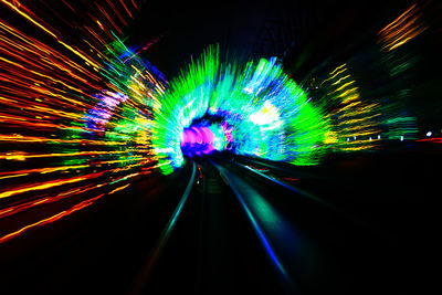 Light trails on illuminated tunnel