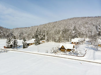 Winter in wooden village in lika, croatia