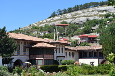 Houses with mountain range in background