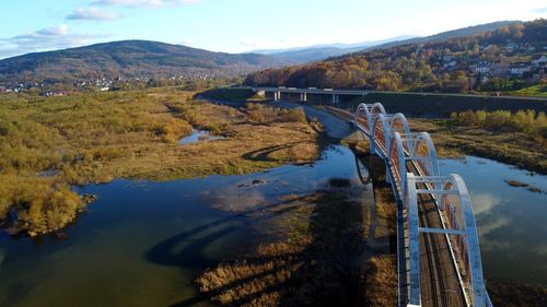 Bridge over river against sky