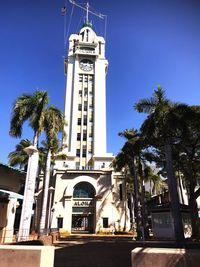 Low angle view of building against blue sky