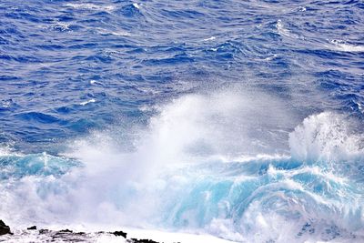 Sea waves splashing on shore