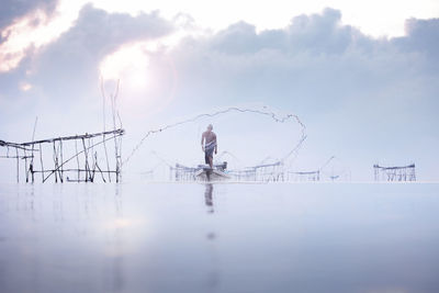 Reflection of woman in water