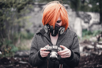 Portrait of man photographing