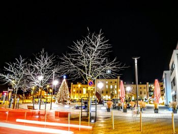 Illuminated street lights at night