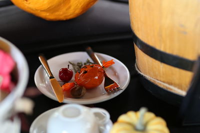 Close-up of fruits in plate on table