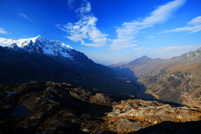 Majestic view of mountain peak against cloudy sky