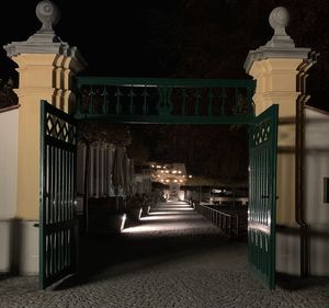 Illuminated entrance of building at night