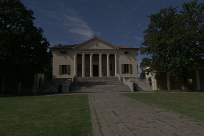 Facade of historic building against sky