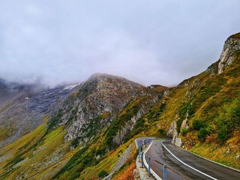 Scenic view of mountain road against sky