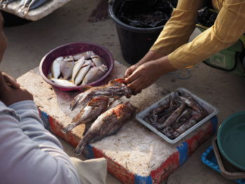 High angle view of person preparing food on table