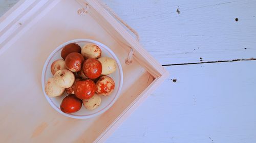 High angle view of fruits in bowl on table