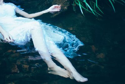 Woman swimming underwater