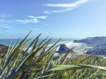 Scenic view of calm sea against blue sky