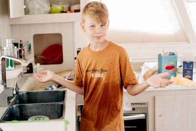 Side view of young woman preparing food at home