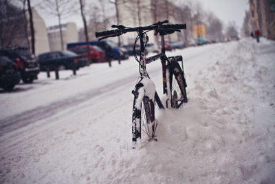 Bicycle on snow covered road