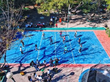 High angle view of people at swimming pool