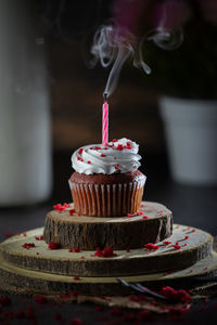 Close-up of cupcakes on cake