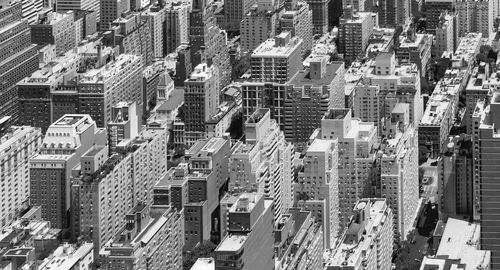 High angle view of street amidst buildings in city