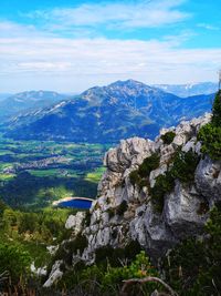 Scenic view of landscape and mountains against sky