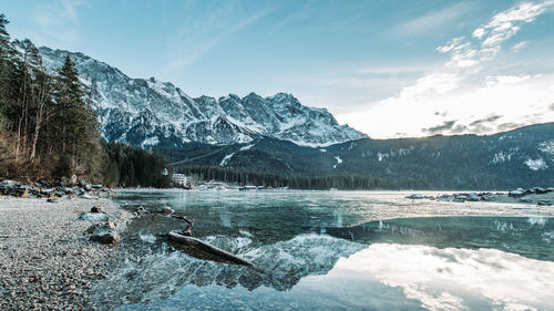 Scenic view of snowcapped mountains against sky