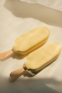 High angle view of hand holding knife