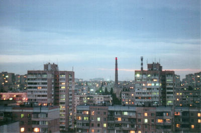 Buildings in city against sky