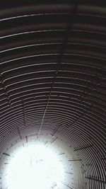 Low angle view of illuminated ceiling