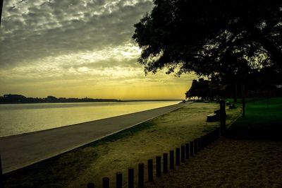 Scenic view of lake against sky during sunset