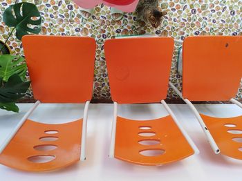 Close-up of orange juice on table