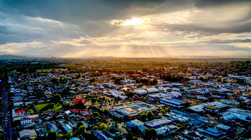 High angle view of townscape against sky at sunset