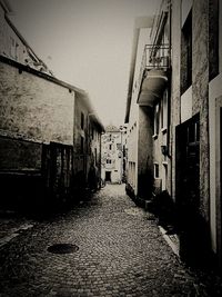 Narrow alley along buildings