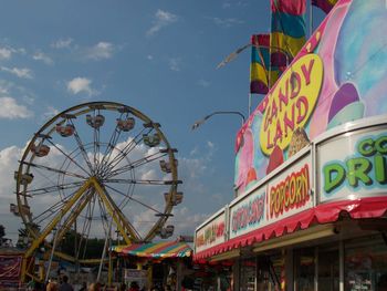 Low angle view of ferris wheel against sky