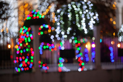 Illuminated christmas tree at night