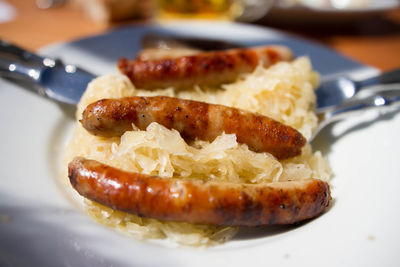 German sausages and cabbage on a plate