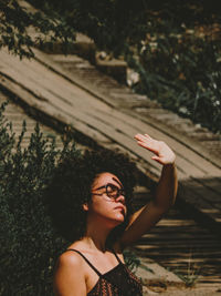 Portrait of young woman using mobile phone