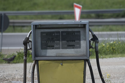 Close-up of information sign on road