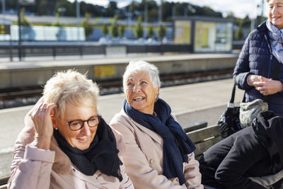 Senior women waiting at train platform