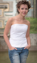 Portrait of smiling woman standing outdoors