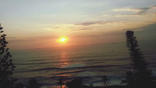 Scenic view of sea against sky during sunset