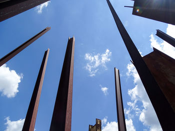 Low angle view of buildings against blue sky